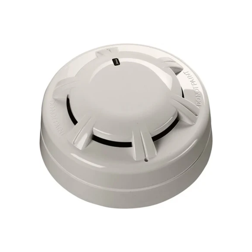 Apollo fire alarm sensor with ULC listing and system sensor features, mounted on a ceiling for fire detection.