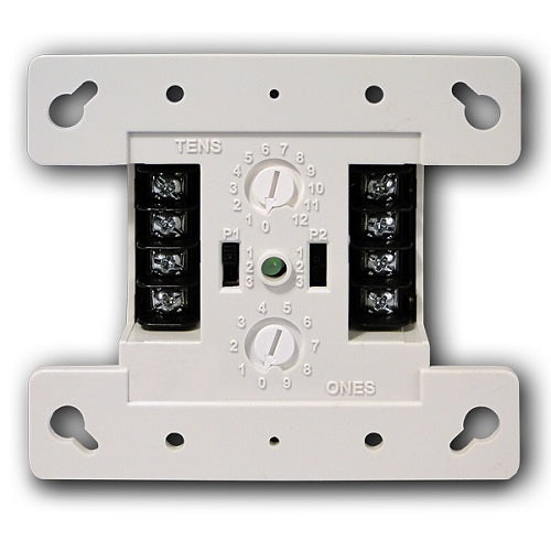 Kidde FX-T3T4 fire alarm smoke detector mounted on ceiling with white plastic casing and test button visible