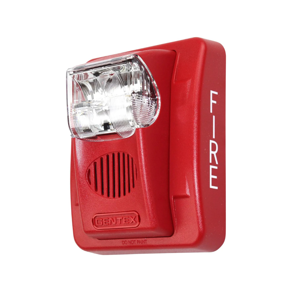 Gentex GEC3-24WR Horn Strobe with red housing and clear lens, mounted on a wall for emergency signaling.