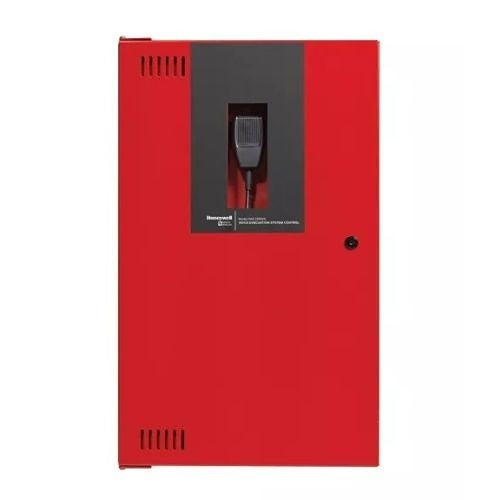 Silent Knight SKE-ZN6 fire alarm with smoke detection and alarm indicator, mounted on wall in a safety system setup.