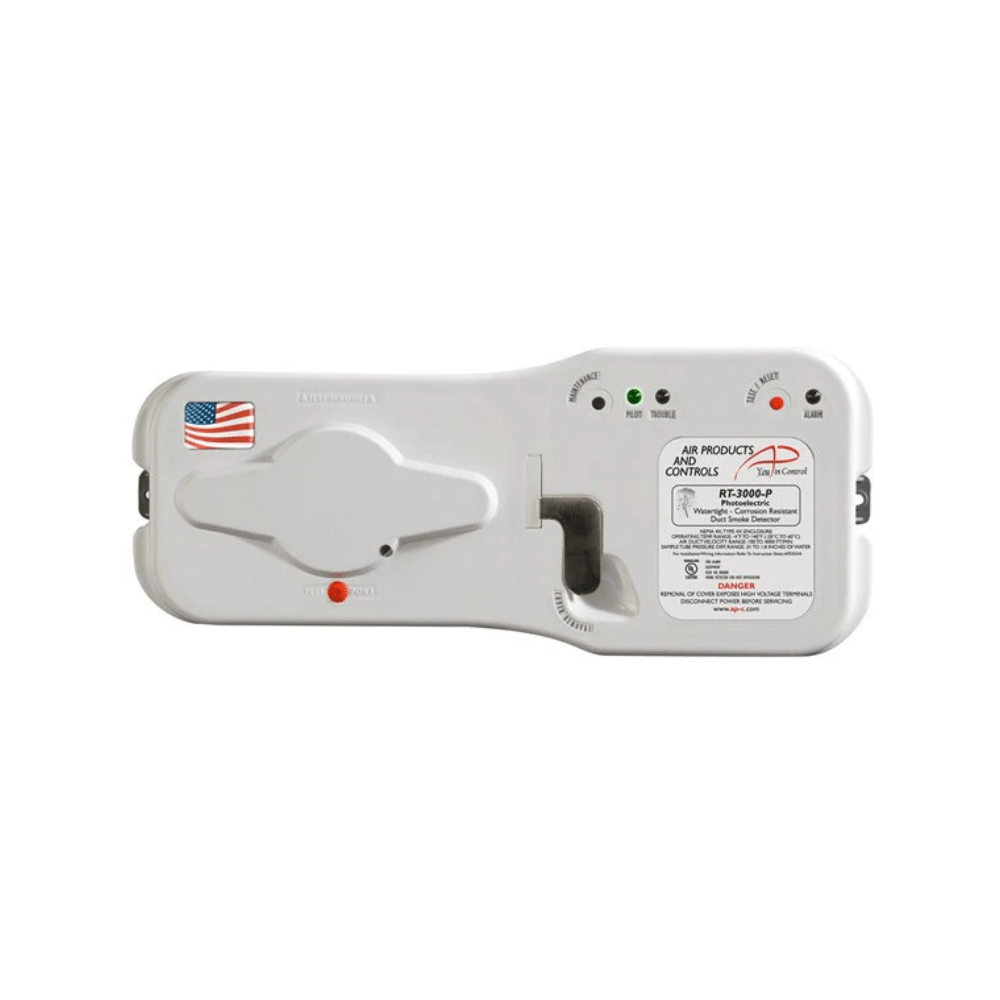 Air Products and Controls APC RT-3000-P fire alarm with alarm indicator and control buttons, mounted on a wall.