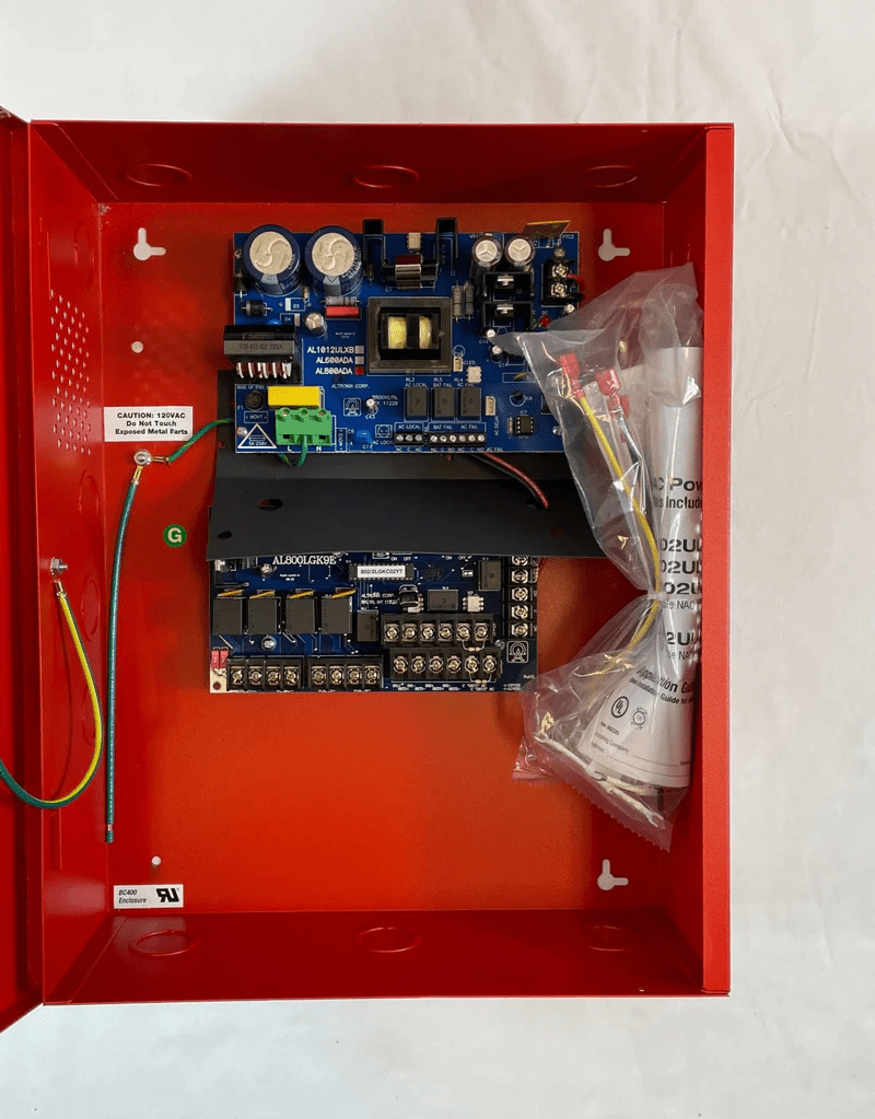 Altronix AL802ULADA power supply unit with dual output, mounted on a white background.