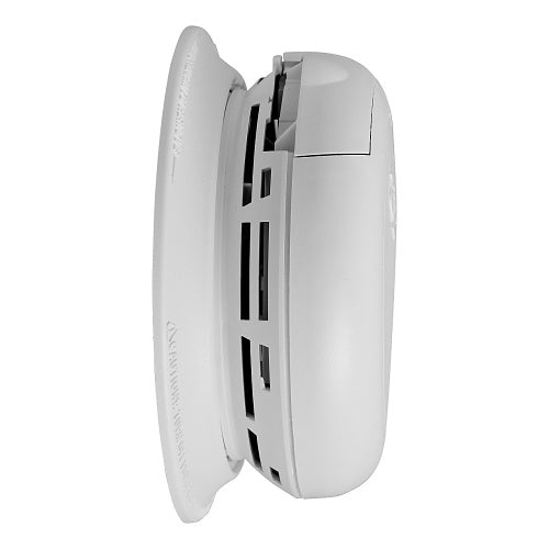 BRK SMCO100V-AC smoke and CO alarm with voice alerts mounted on wall, showing digital display and alert indicators.