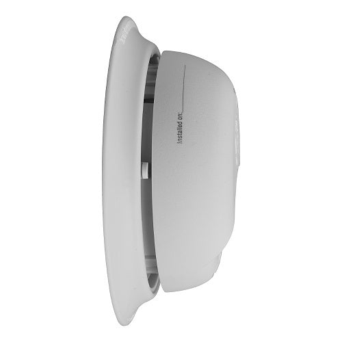 BRK SMI110 smoke alarm with battery operation, mounted on ceiling showing its compact design and test button.