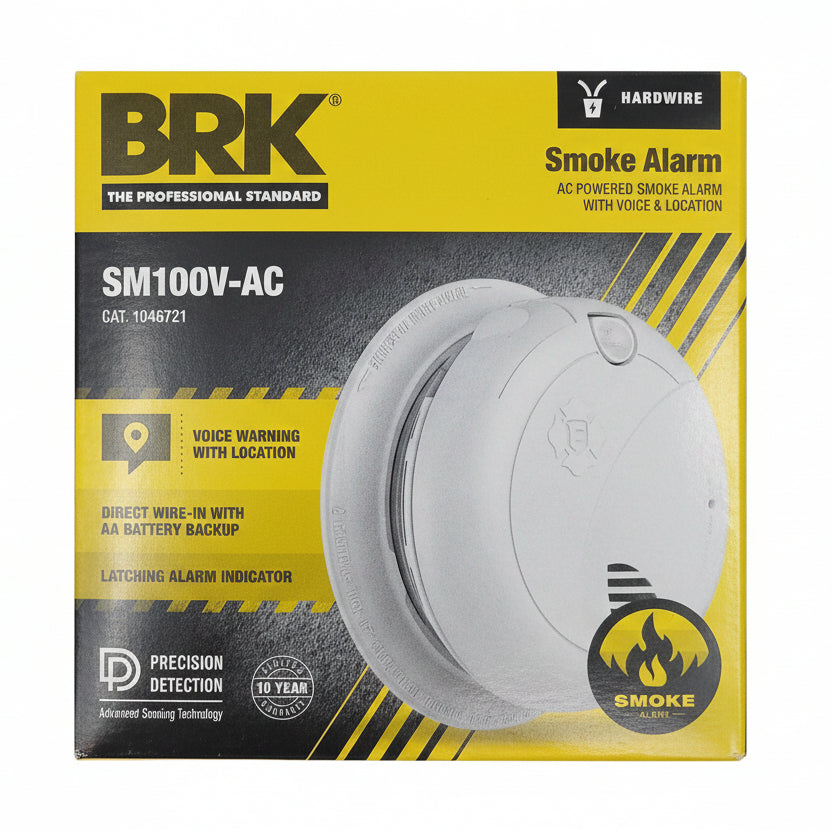 BRK SMI100V-AC smoke alarm with voice alerts, mounted on ceiling, featuring LED indicator and test button.