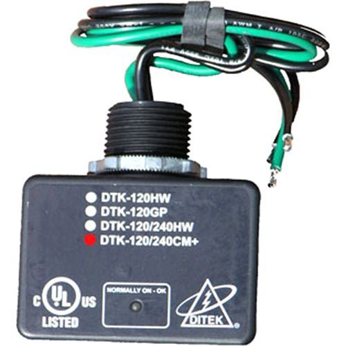 Ditek DTK-120/240CM+ surge protection device mounted on electrical panel with cables and wiring in a professional setting