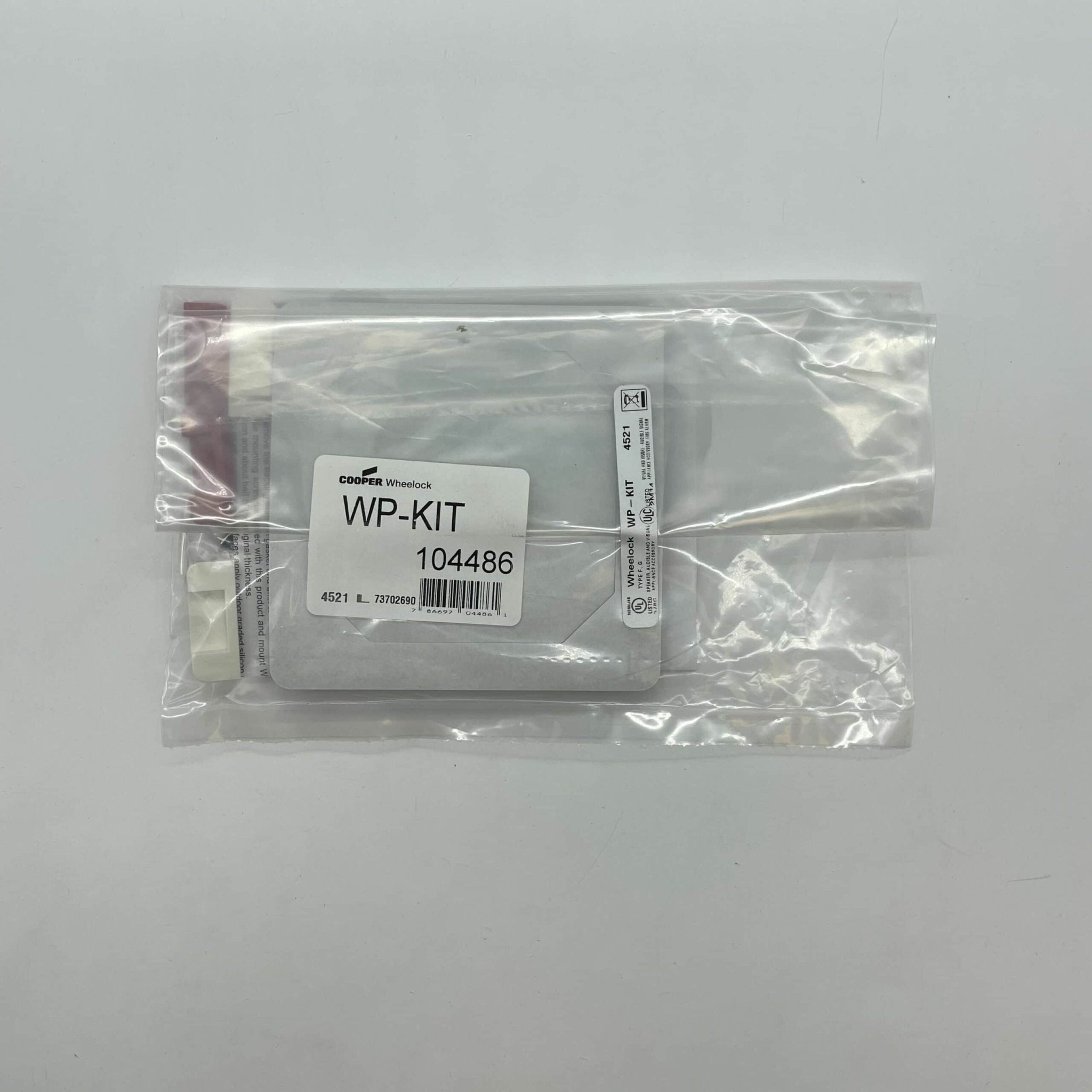 Eaton Wheelock WP-KIT backboxes with mounting hardware, suitable for electrical installations and system setups.