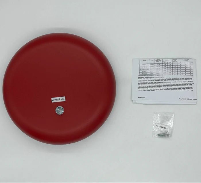 Eaton Wheelock MB-G10-24-R emergency alarm bell with metal housing and mounting bracket, designed for security systems.