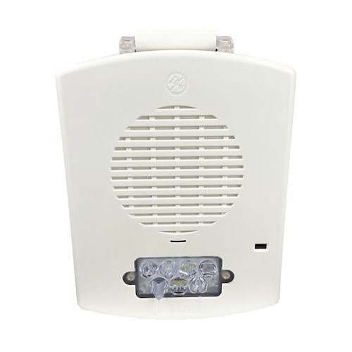 Eaton Wheelock EL3RSPST-FW emergency alarm switch with red button and black housing, mounted on a white panel.