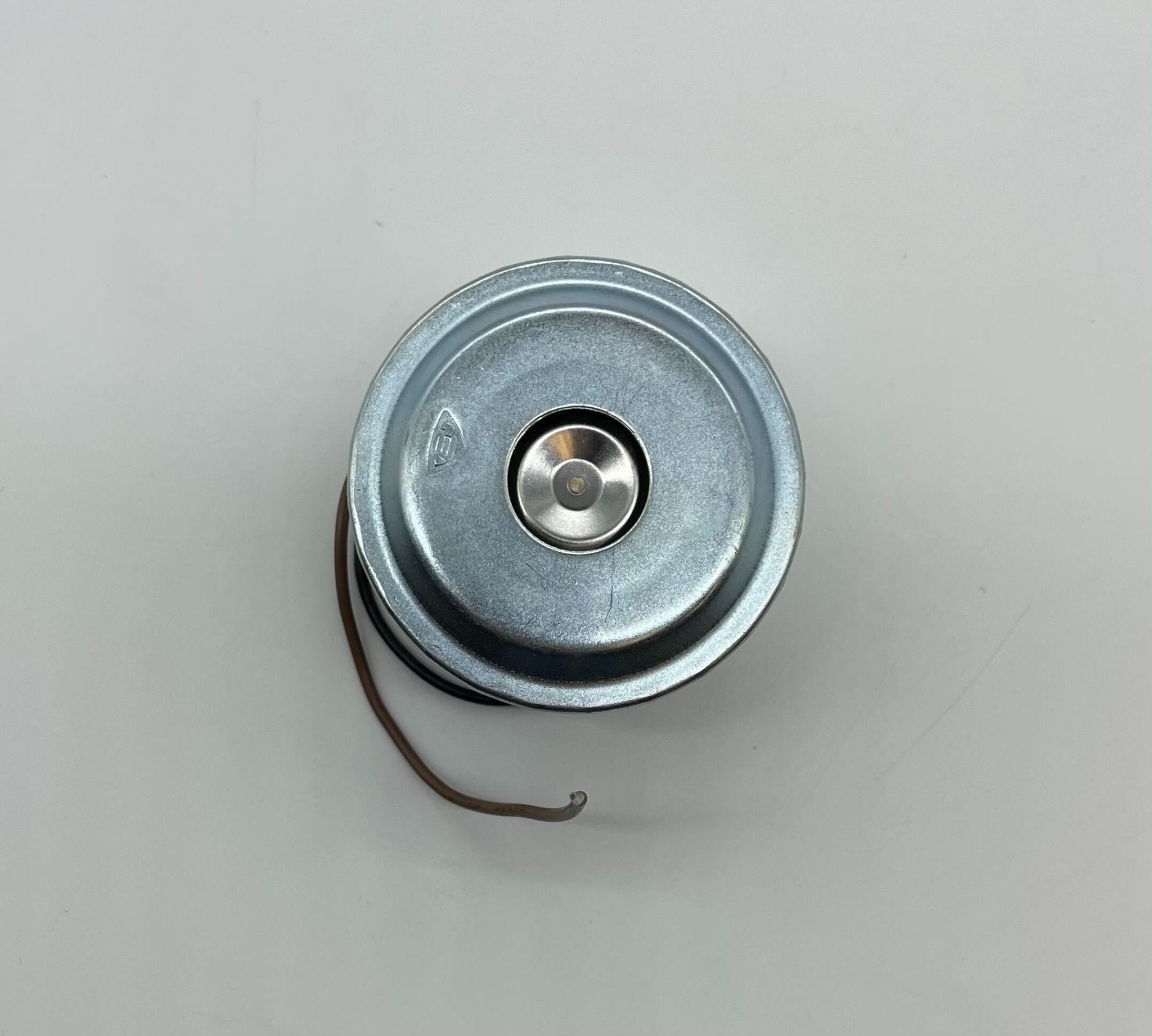 Edwards 123A-N5 horn, industrial sounder with a black and silver metal body, mounted on a white background.
