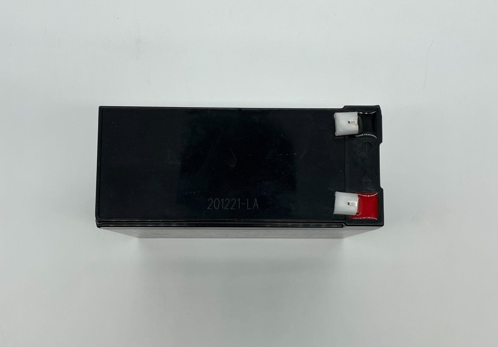 Edwards 12V 10A battery showing a compact, rectangular design with branding and terminal connections on top.