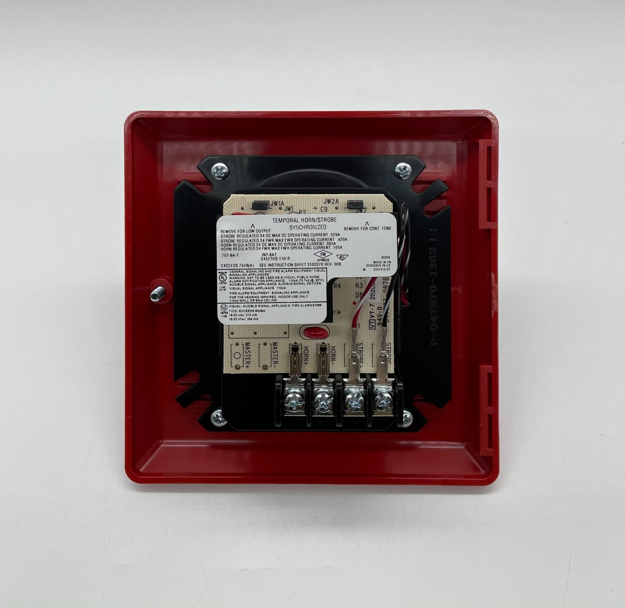 Edwards 2452THS-110-R strobe light with clear lens and mounting bracket on a white background.