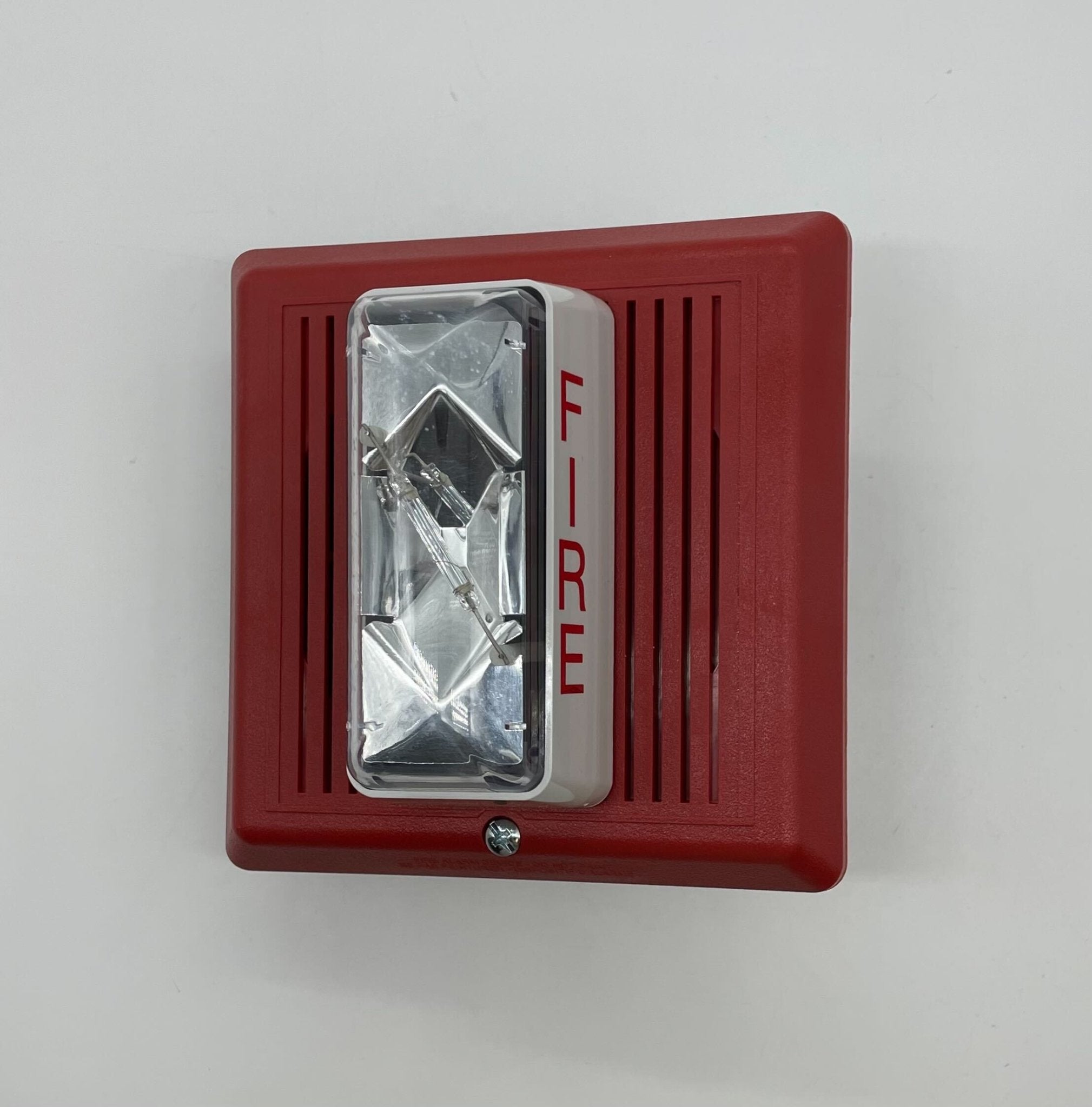 Edwards 2452THS-15/75-R horn strobe alarm with red housing and mounting base, designed for emergency notification systems.