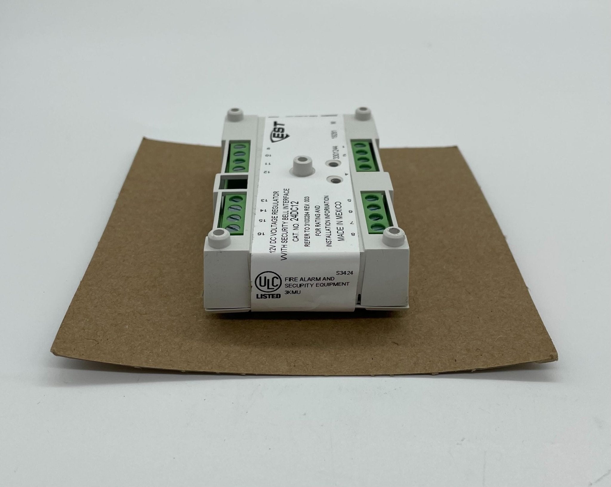 Edwards 24DC12 power supply showing connections and front view, manufactured by Edwards for industrial power applications.