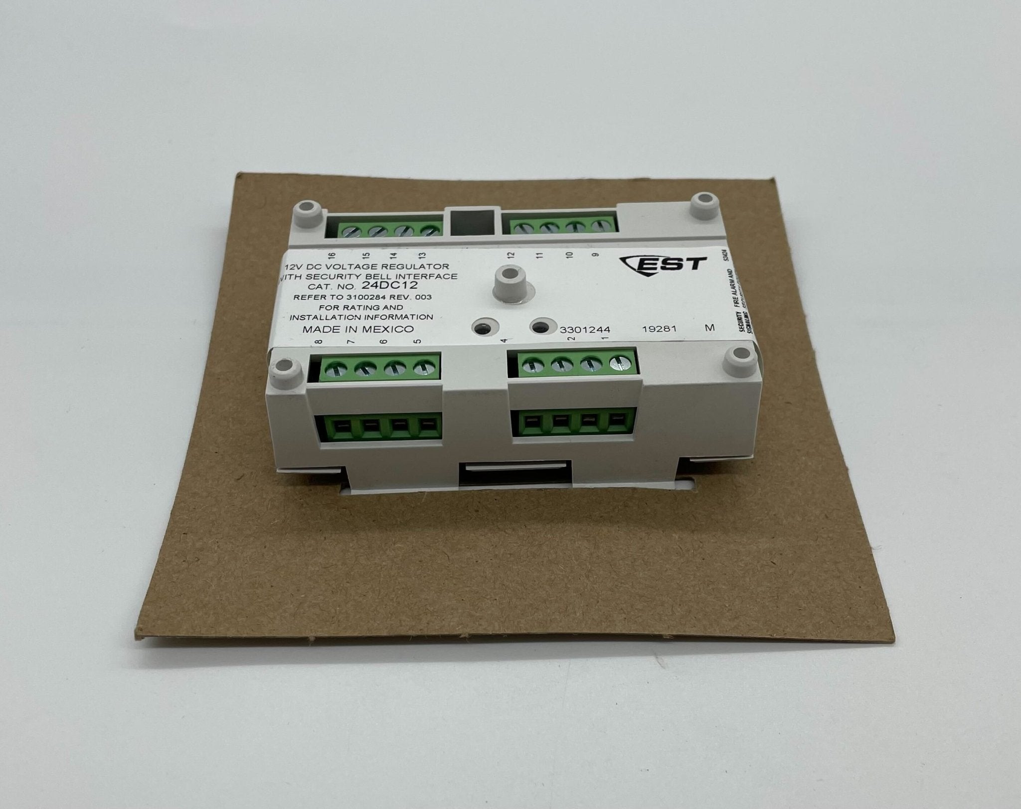 Edwards 24DC12 power supply unit with digital display and connection ports, designed for industrial automation systems.