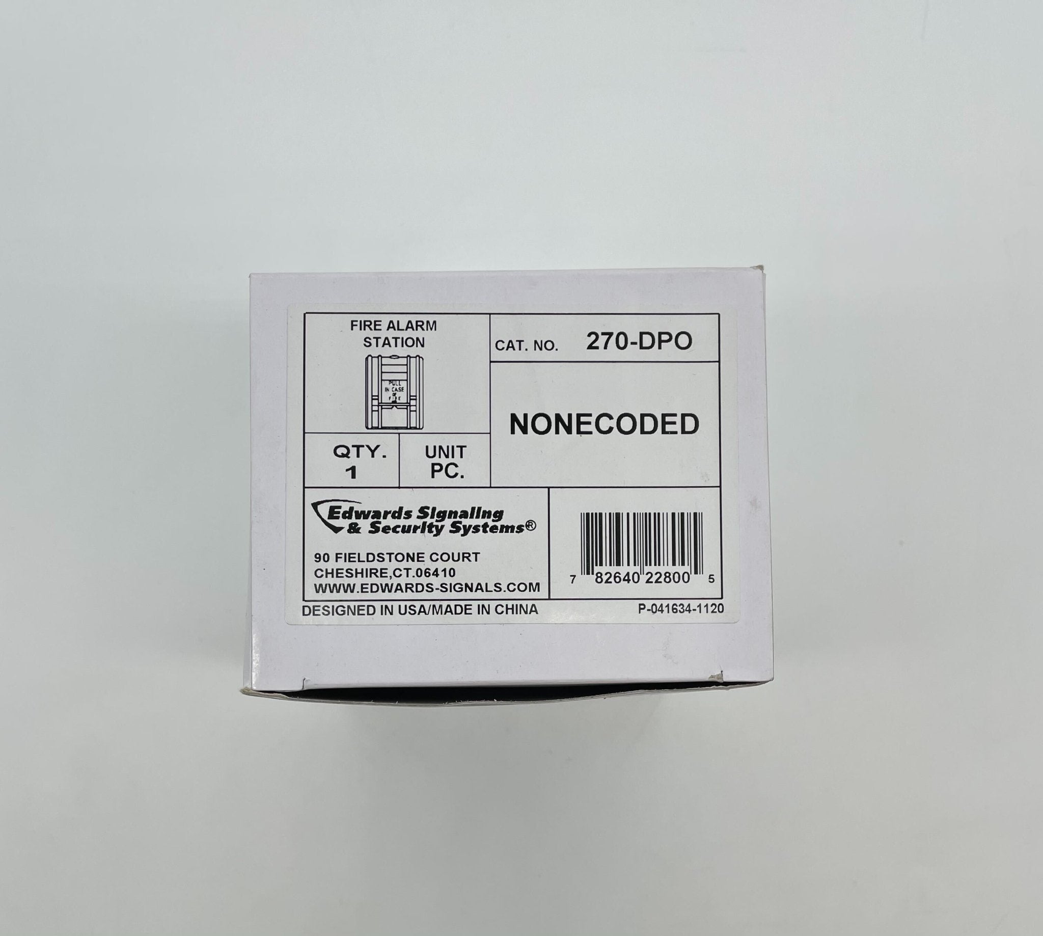 Edwards 270-DPO pull station fire alarm device mounted on wall with red handle and labeling, used for emergency fire alerts.