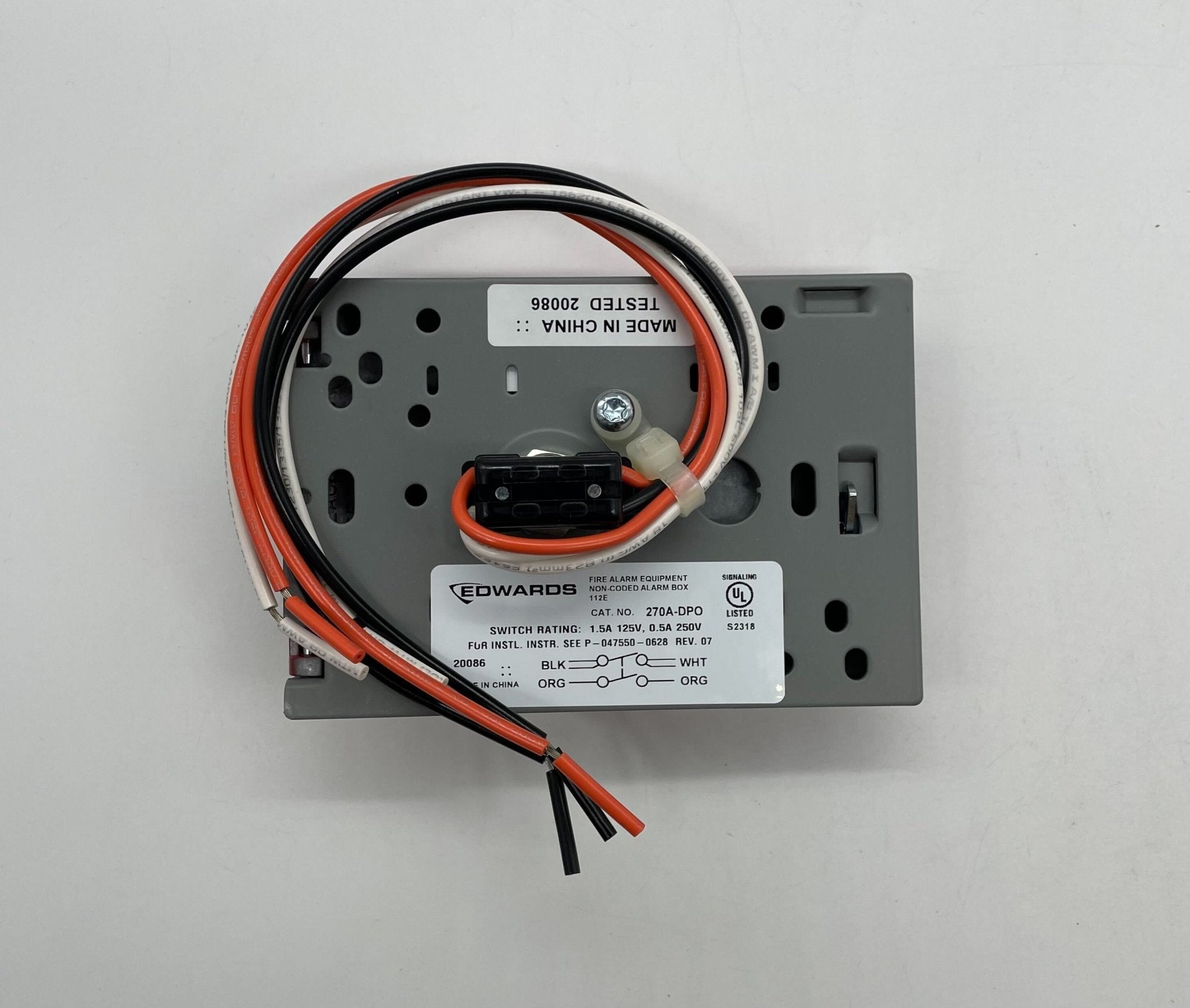 Edwards 270A-DPO pull station fire alarm device mounted on a wall with safety labels and emergency instructions