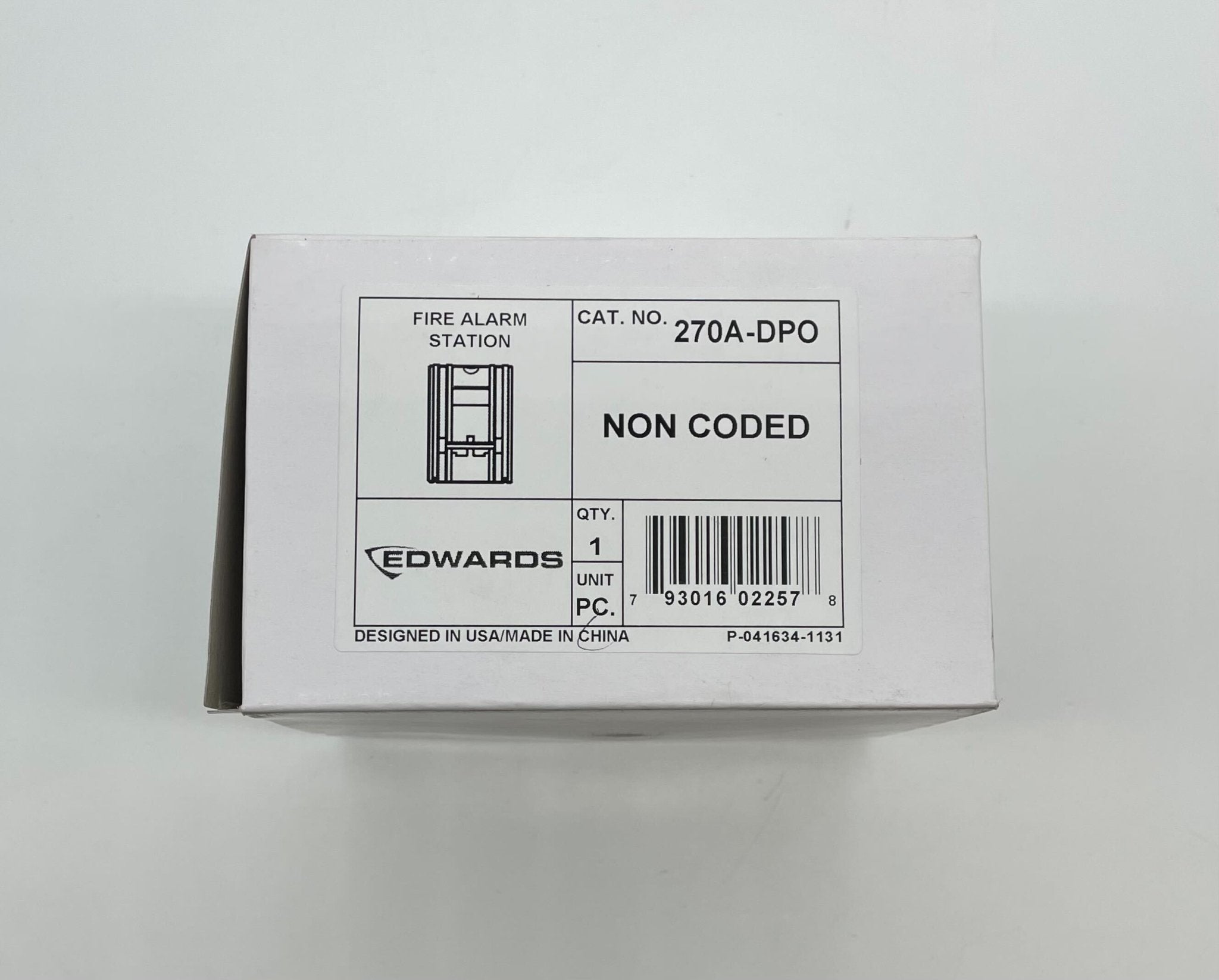 Edwards 270A-DPO pull station fire alarm device mounted on wall with warning label, part of Edwards fire safety equipment.