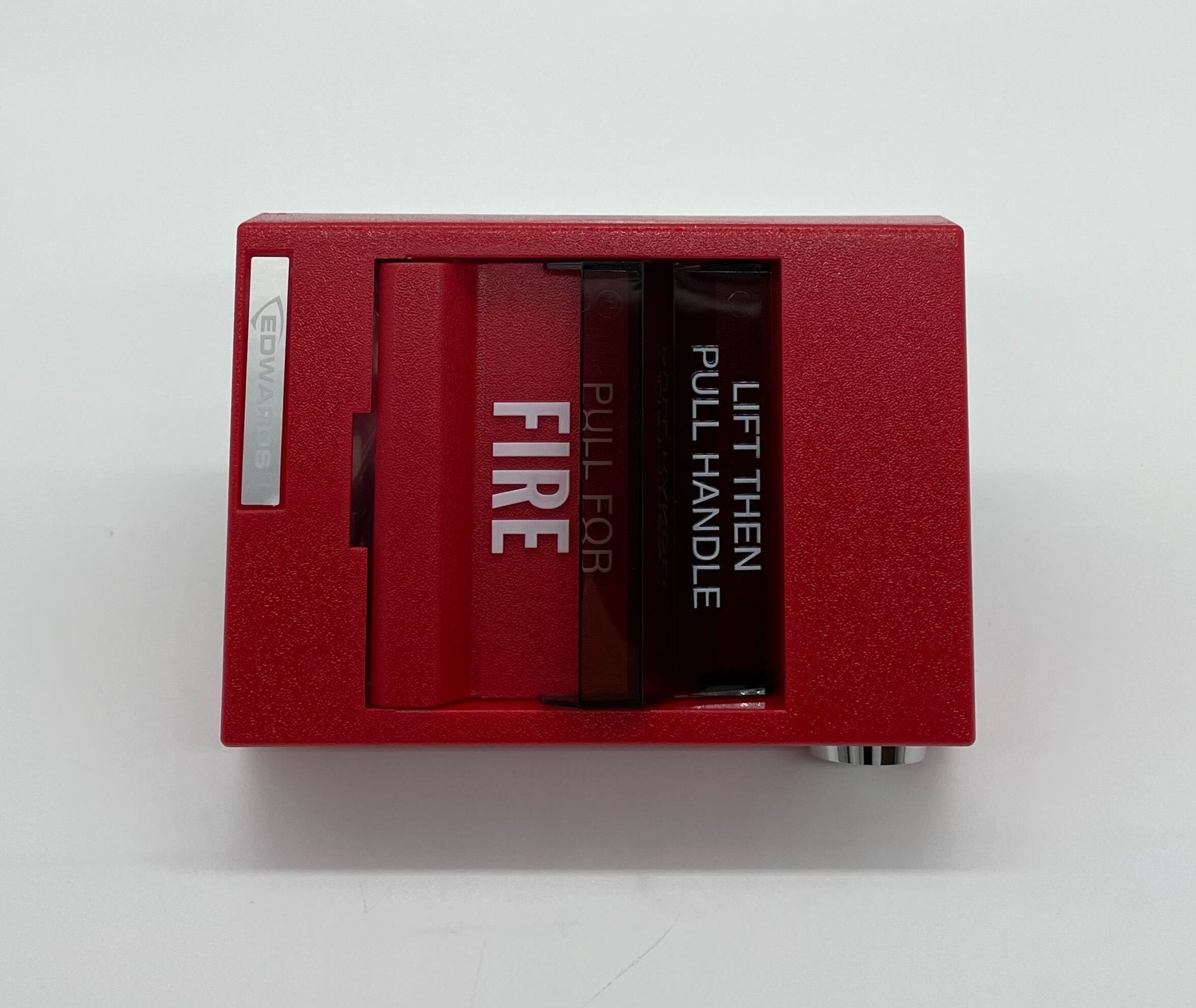 Edwards 278B-1120 pull station fire alarm device mounted on wall with clear label and metal casing.