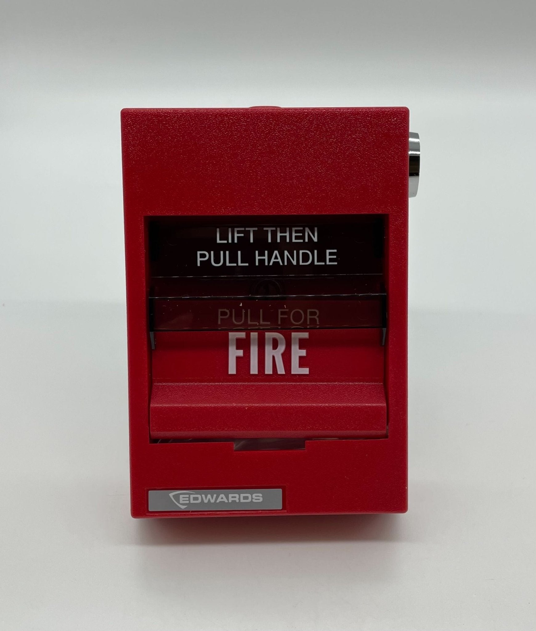 Edwards 278B-2320 pull station fire alarm switch mounted on a wall with clear labeling and safety instructions.