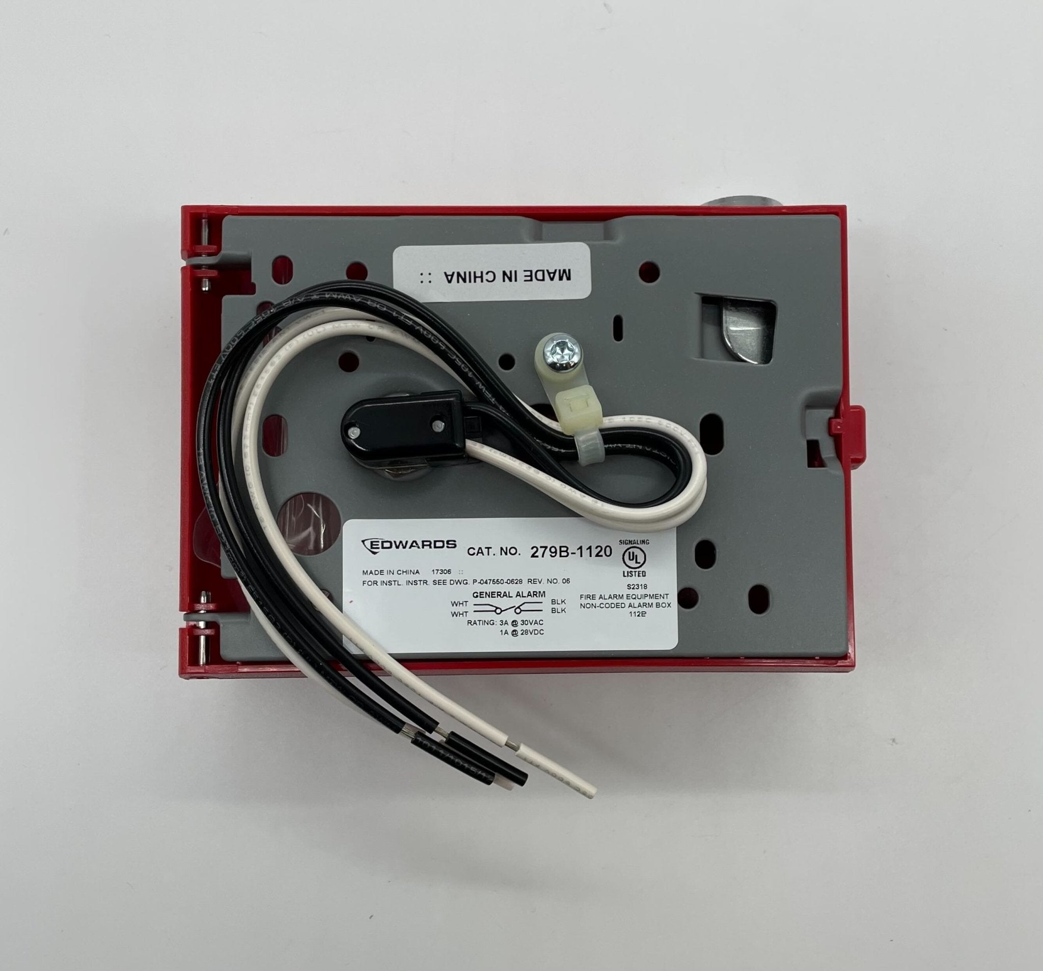 Edwards 279B-1120 pull station fire alarm switch with red cover and warning label, mounted on wall.