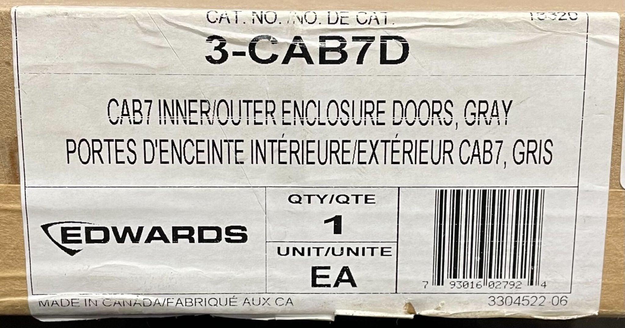 Edwards 3-CAB7D fire alarm with digital display and smoke detection sensors, mounted on a ceiling.