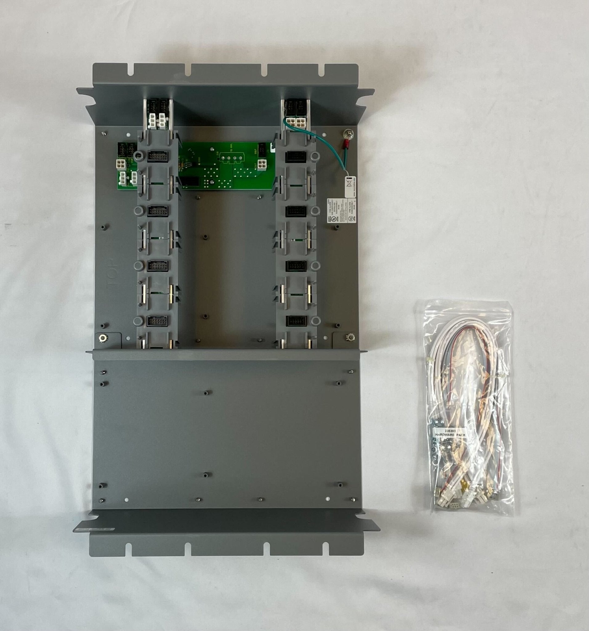 Edwards 3-CHASS4 chassis by Edwards, showing a sleek, durable metal frame with mounting points for industrial equipment.