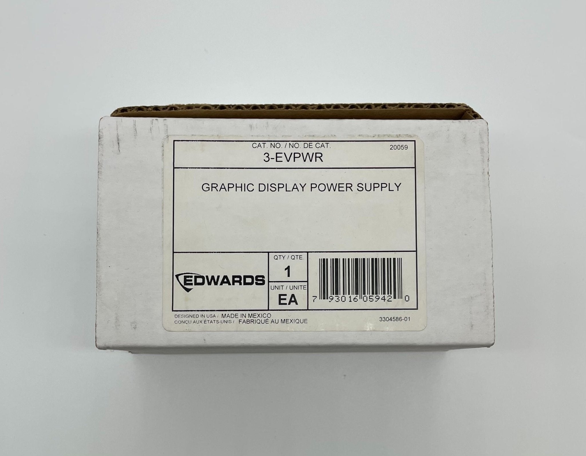 Edwards 3-EVPWR power supply unit with black casing and connection ports, designed for industrial equipment.