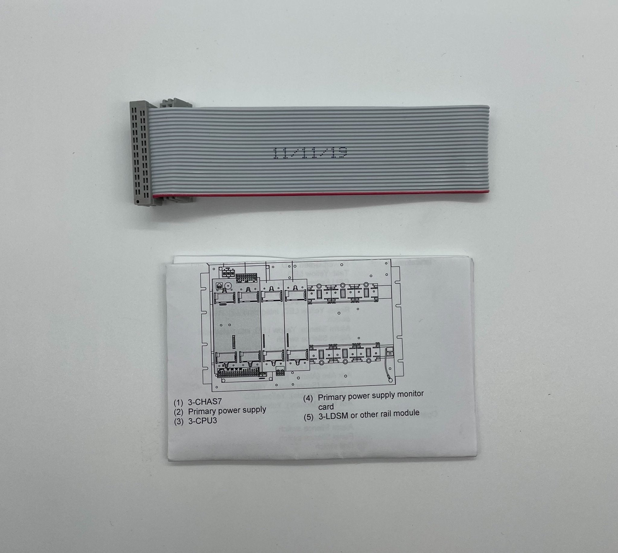 Edwards 3-LCDXL1KBL fire alarm with LCD display and black casing, mounted on a ceiling for fire detection.