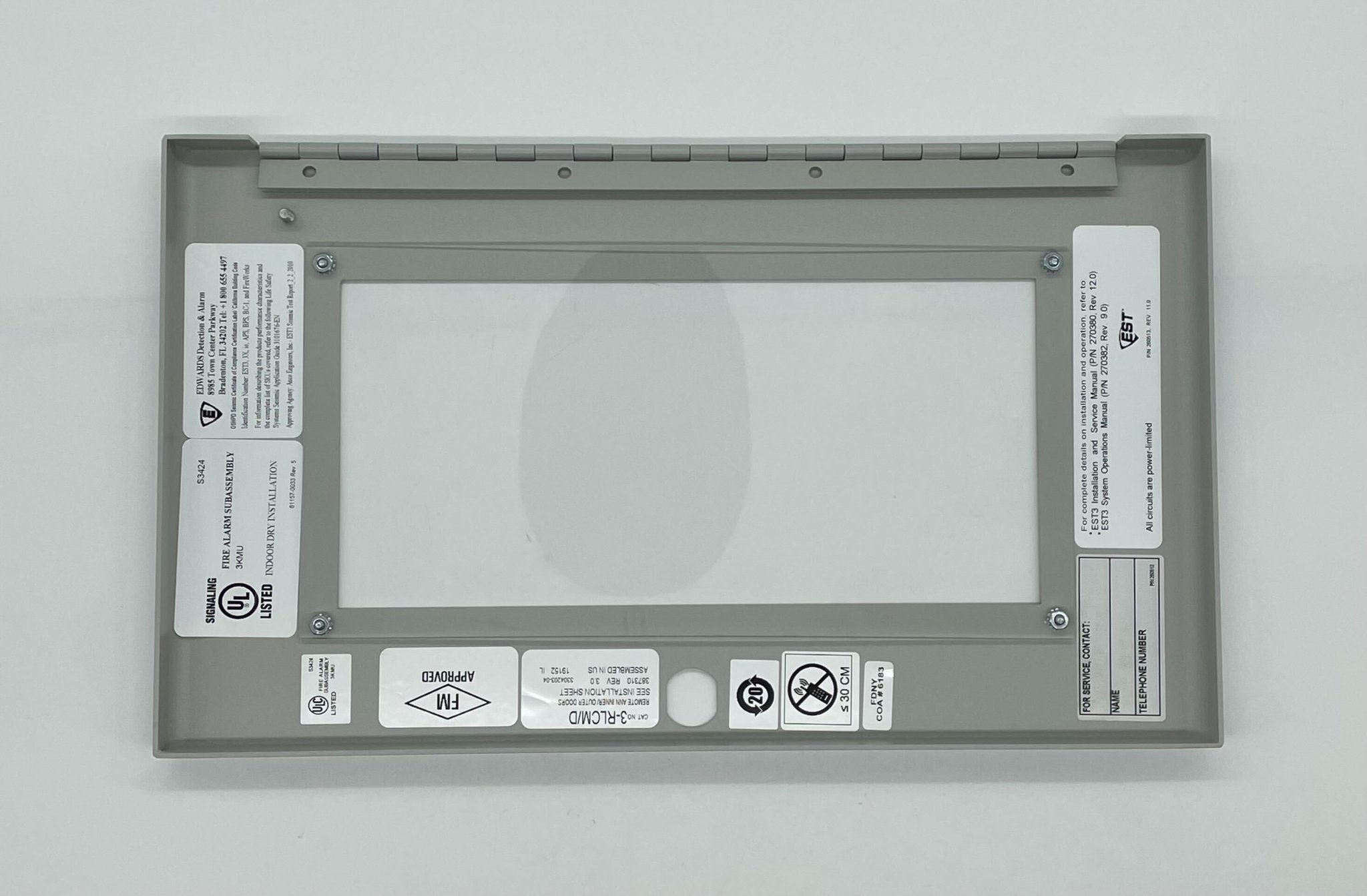 Edwards 3-RLCM/D fire alarm with sensor and wiring, mounted on wall, white plastic housing, designed for fire detection.