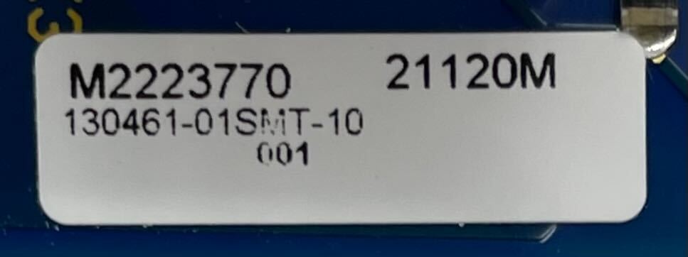 Edwards 3-RS485B fire alarm device mounted on a wall, part of Edwards fire alarm system, with visible wiring and control panel.