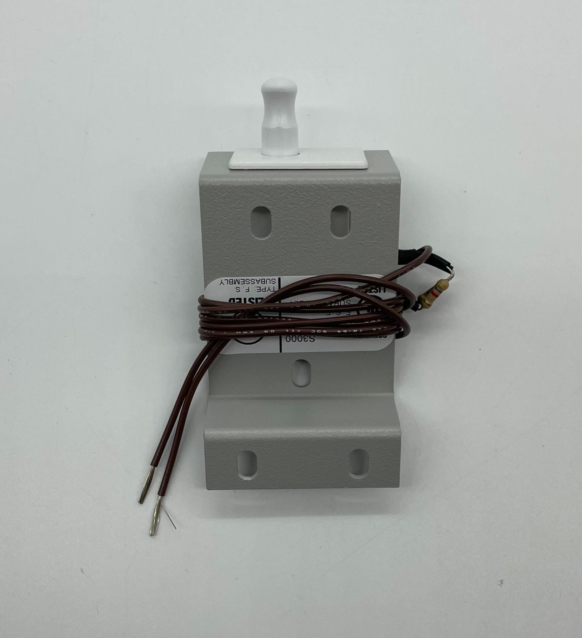 Edwards 3-TAMPRCC fire alarm device mounted on wall, featuring LED indicator and sensor components for fire detection.