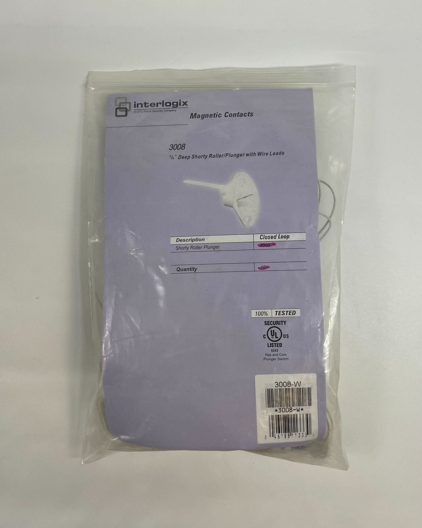 Edwards 3008-W fire alarm mounted on ceiling, white smoke detector with test button and wiring for fire safety system.