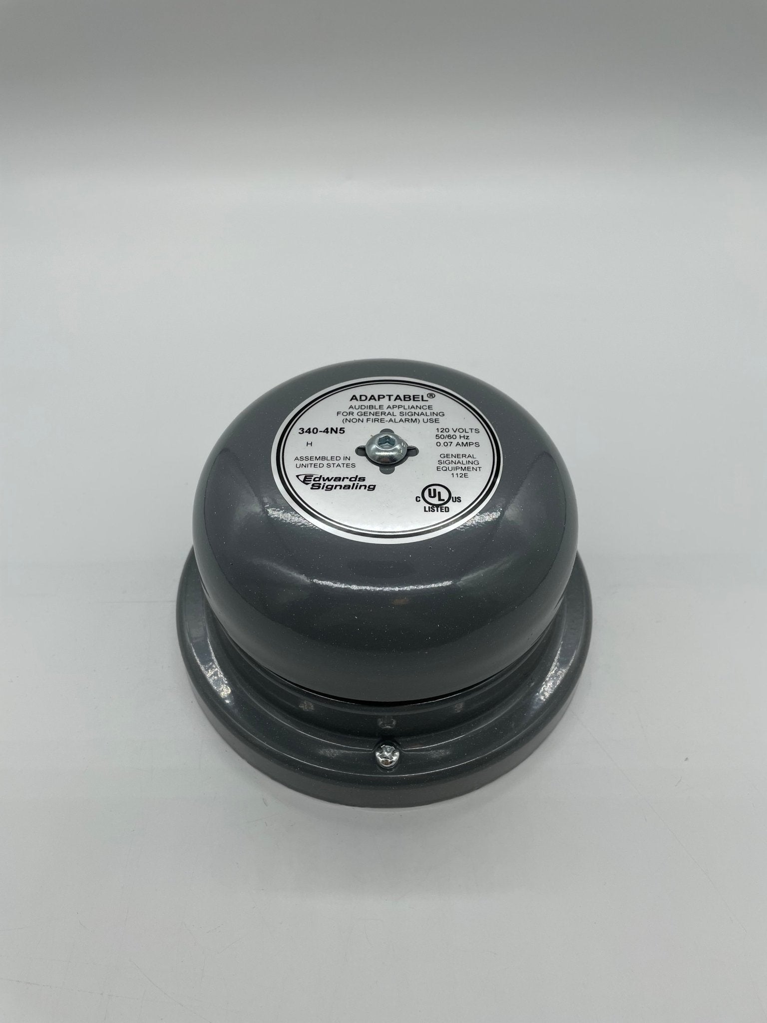 Edwards 340-4N5 brass bell, a vintage-style fire alarm bell with a polished finish, mounted on a metal bracket.