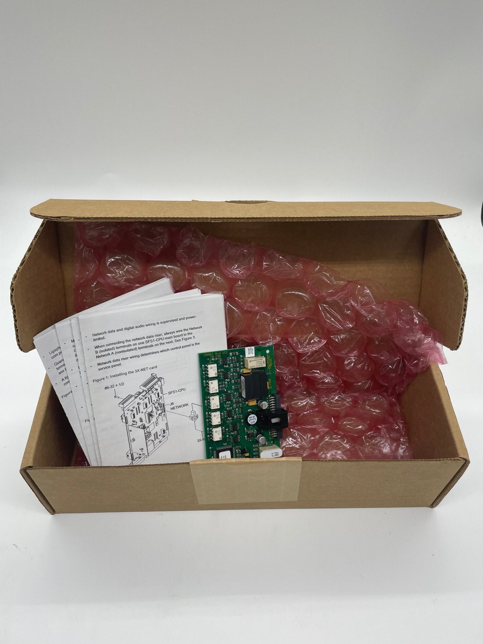 Edwards 3X-NET network card with multiple ports, black circuit board, and metal connectors for computer networking.