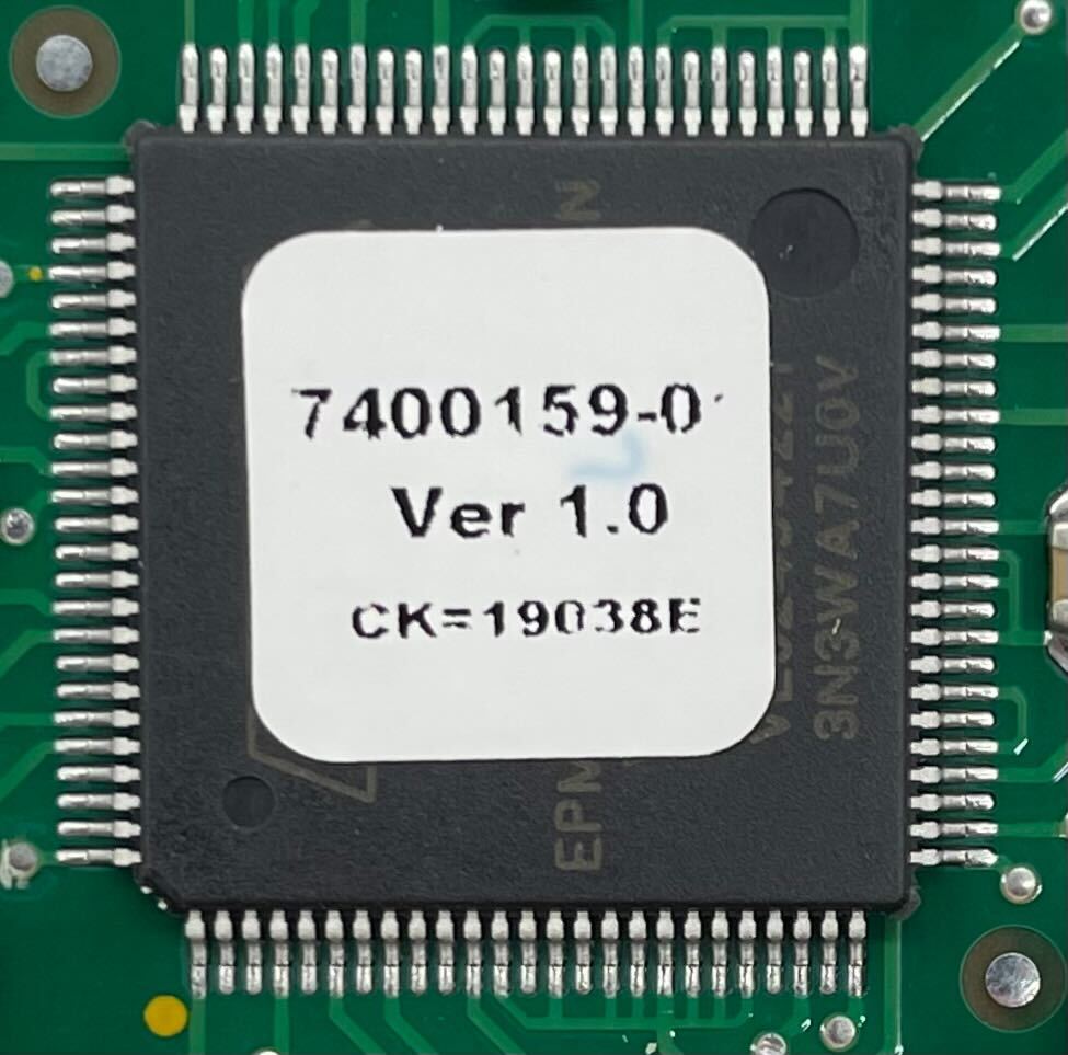 Edwards 3X-NET8 network card, black with multiple ports, mounted on a circuit board, designed for high-performance networking.