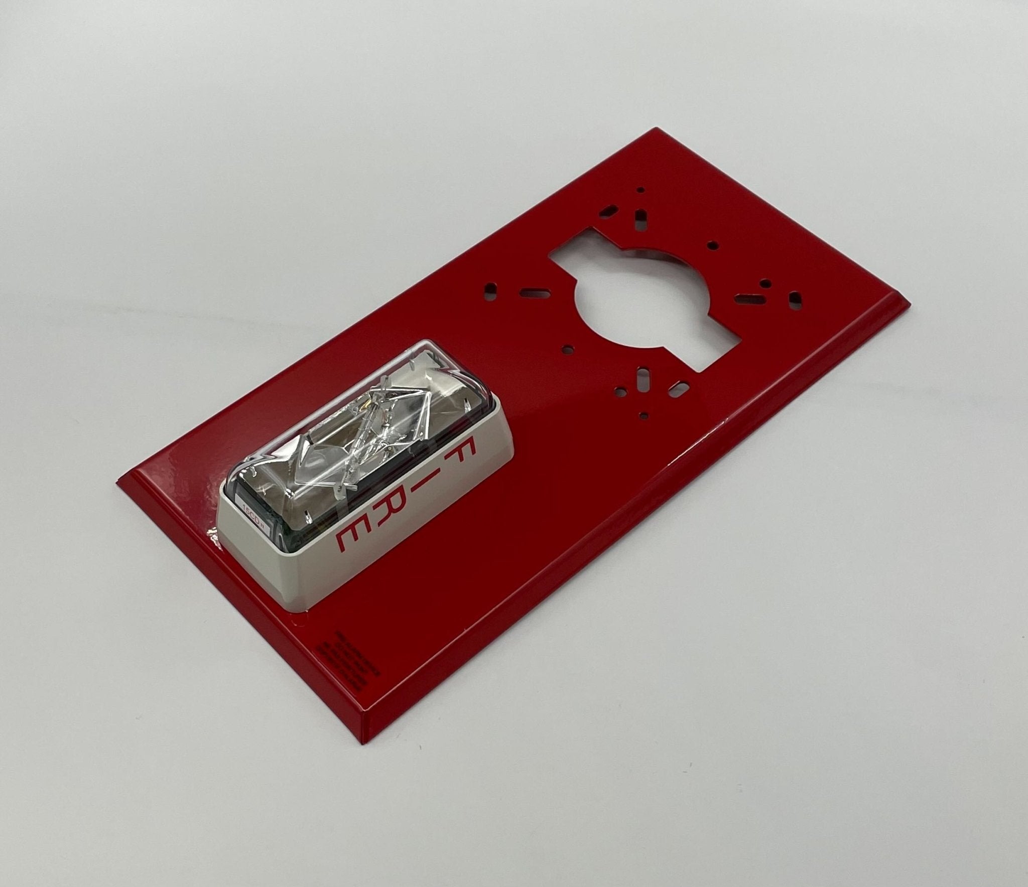 Edwards 403-5A-R strobe light with red lens and mounting bracket, designed for industrial safety and signaling applications.