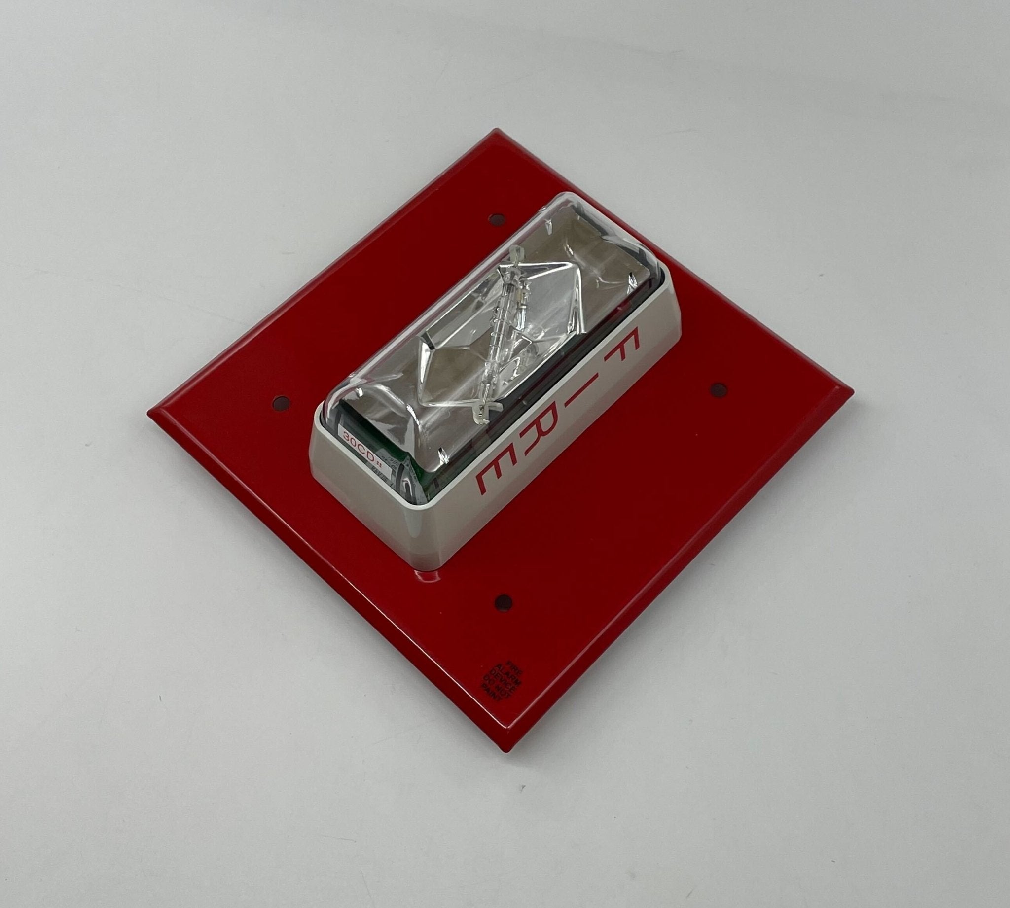 Edwards 405-3A-T strobe light with a clear lens and mounting bracket, designed for industrial safety and signaling applications.