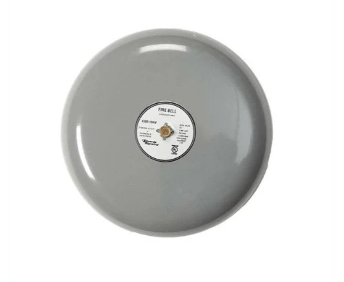 Edwards 439D-10AW fire alarm with white plastic casing and test button, mounted on a wall for fire safety detection.