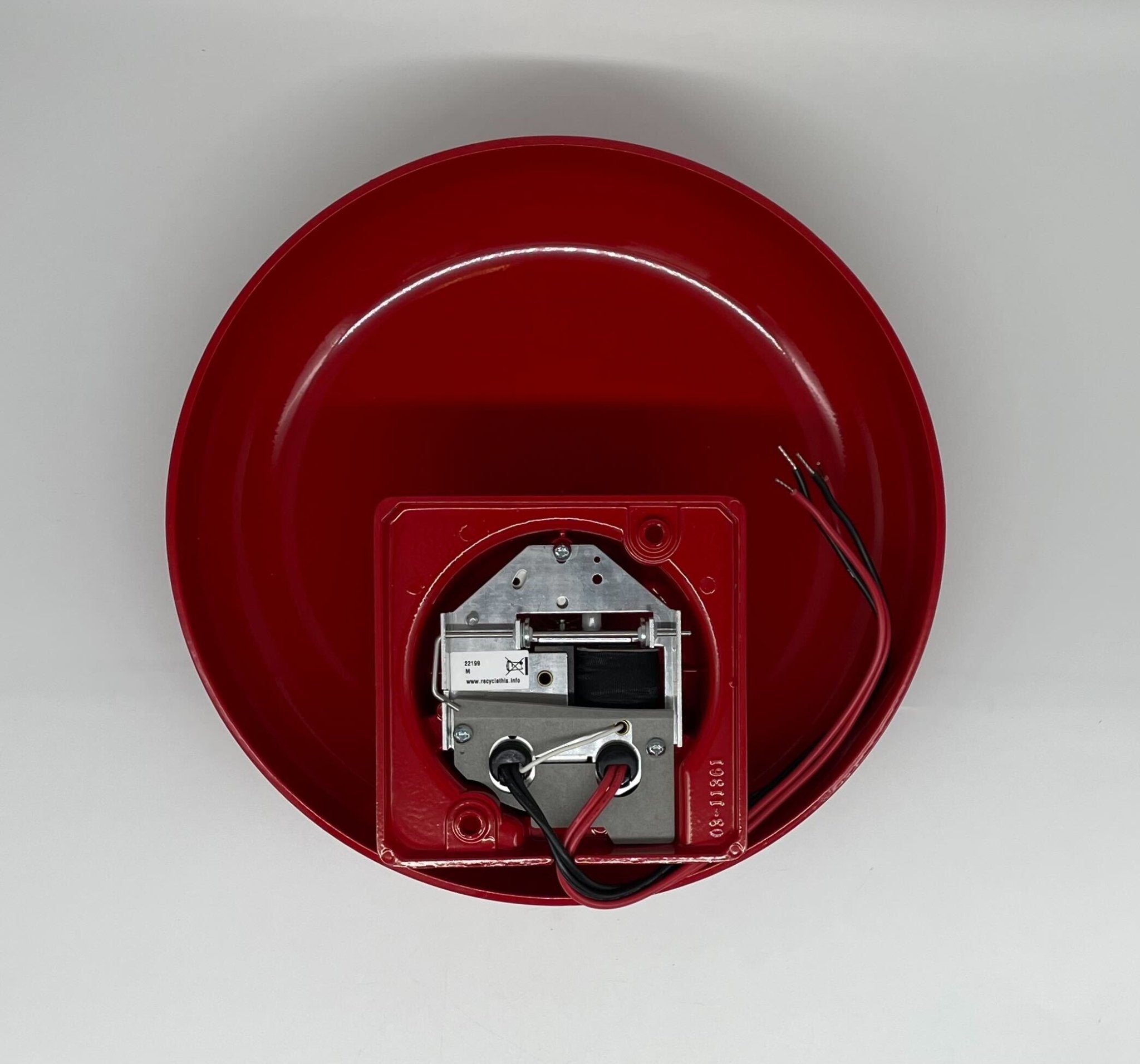 Edwards 439D-10AW-R bell with brass finish, mounted on a metal surface, designed for industrial alarm systems.
