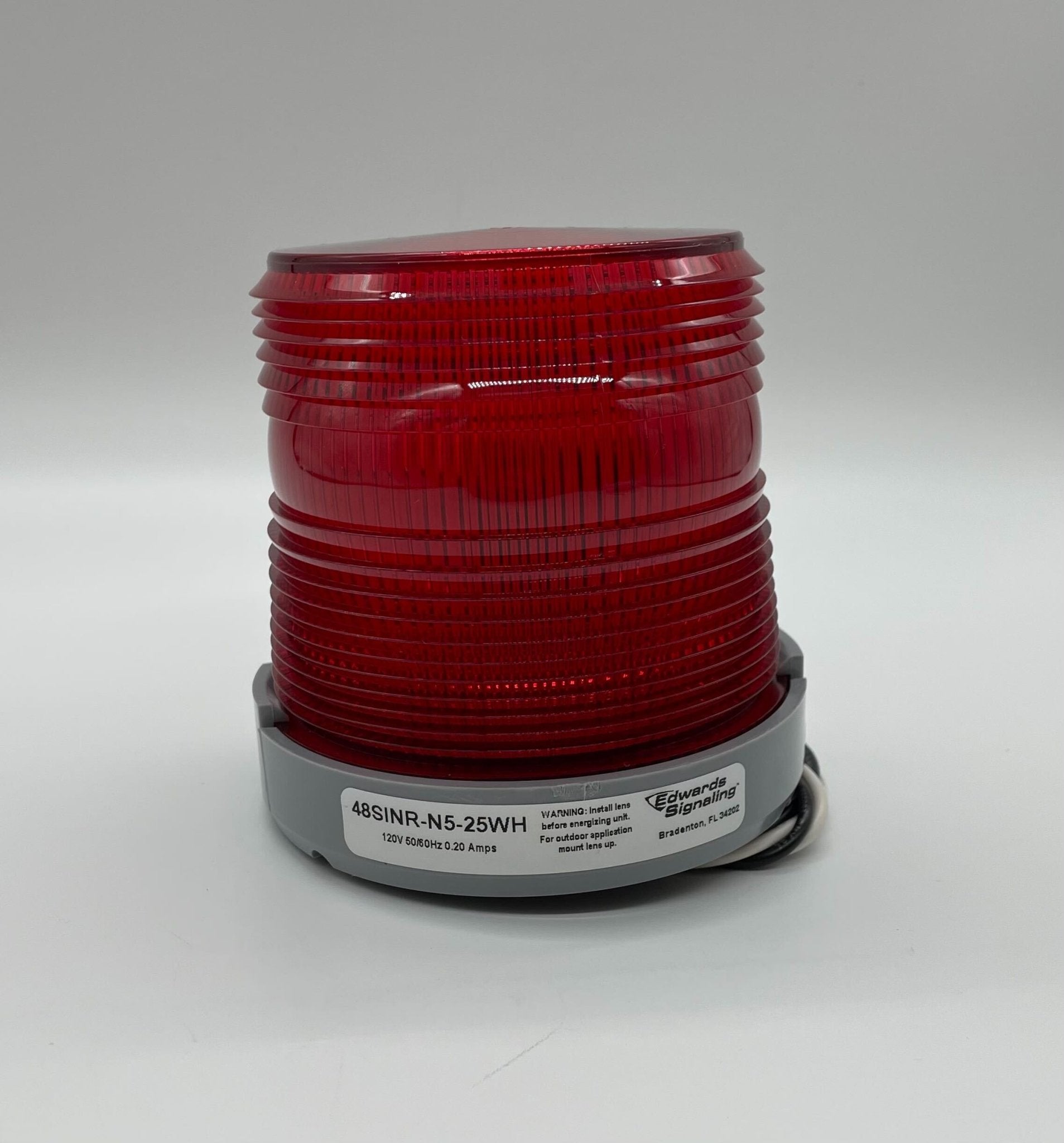 Edwards 48SINR-N5-25WH beacon with red and white warning lights on a metal mounting base.