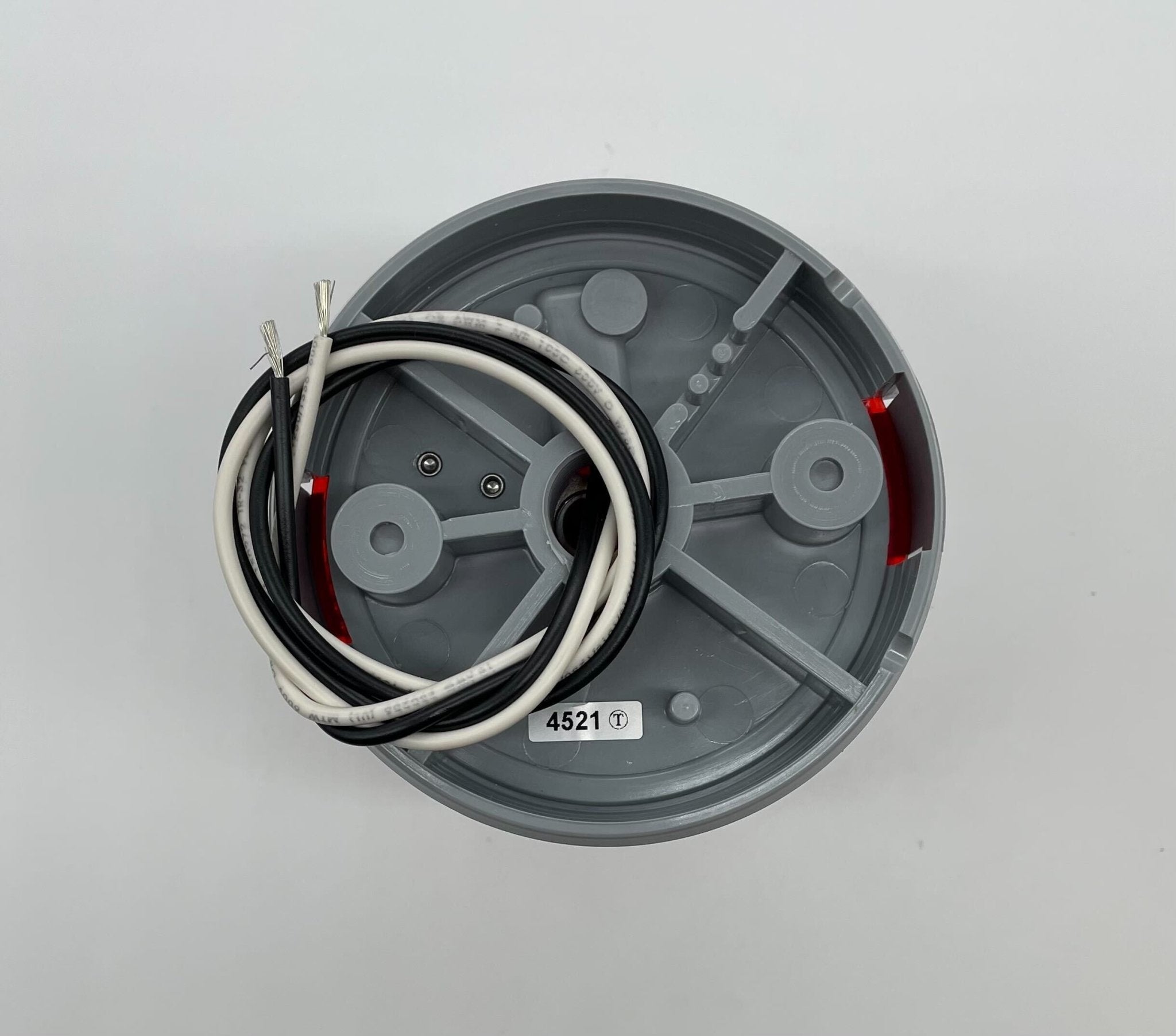 Edwards 48SINR-N5-25WH beacon with red and white warning lights, mounted on a metal fixture for safety signaling.