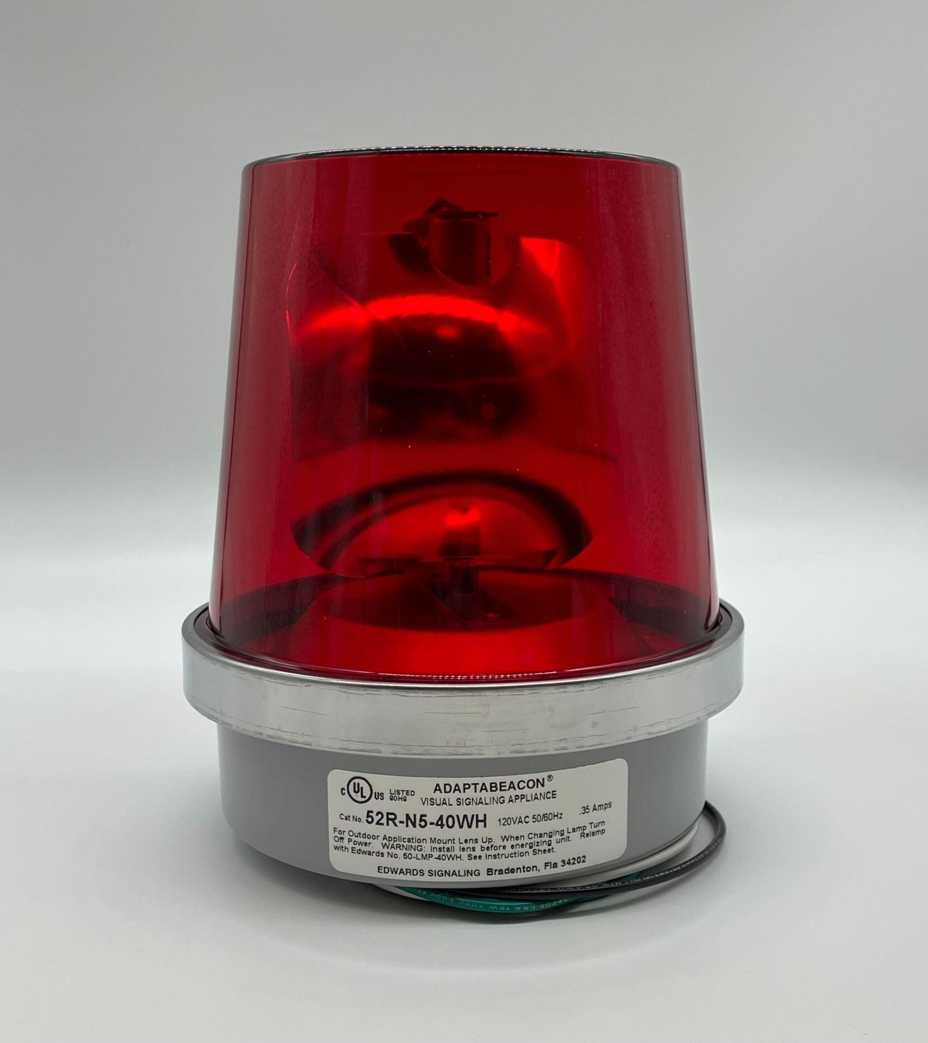 Edwards 52R-N5-40WH beacon with white casing and red lens, mounted on a metal base, used for warning signals.