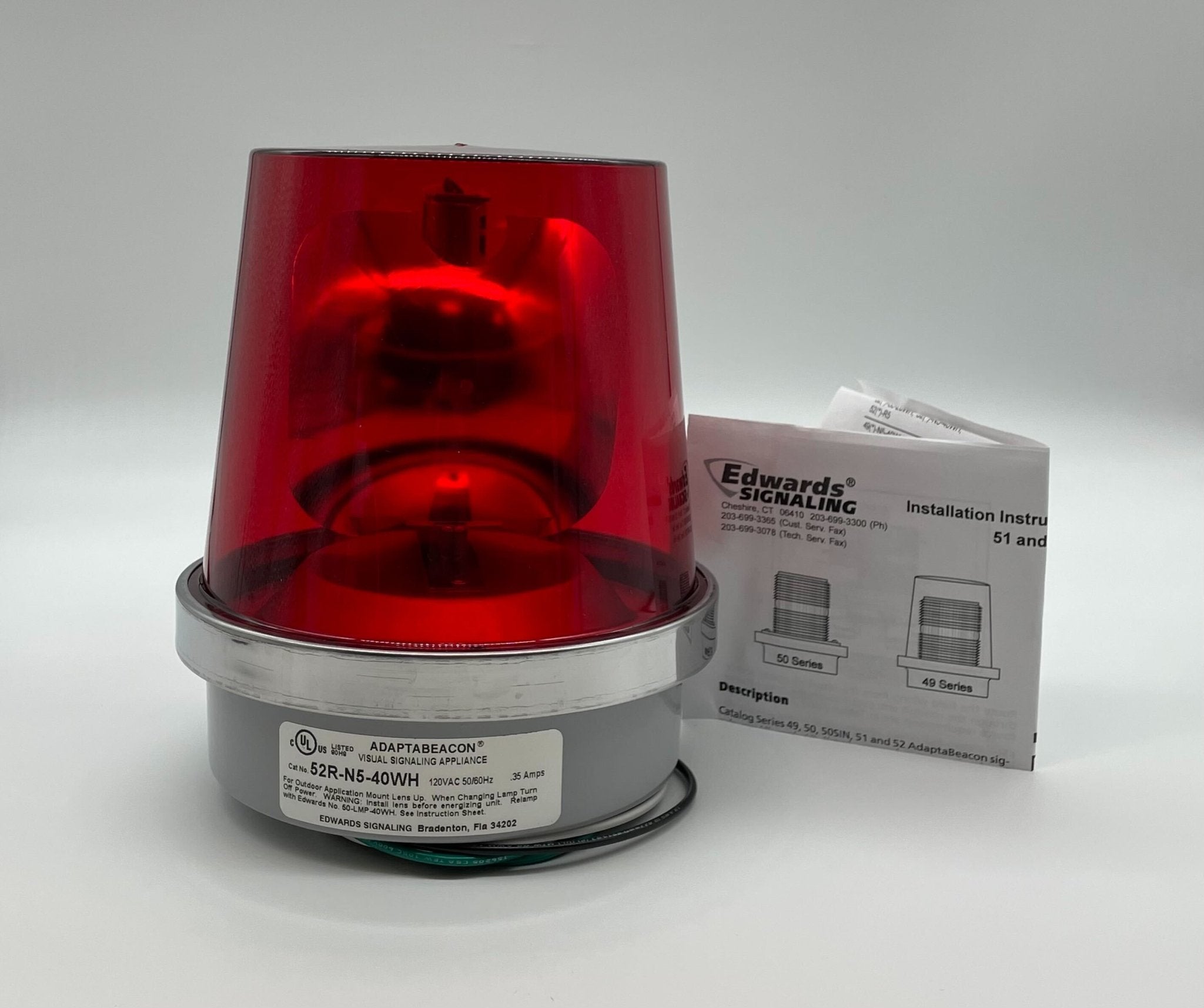 Edwards 52R-N5-40WH beacon with white light and red lens, mounted on a metal base, designed for warning and signaling applications.