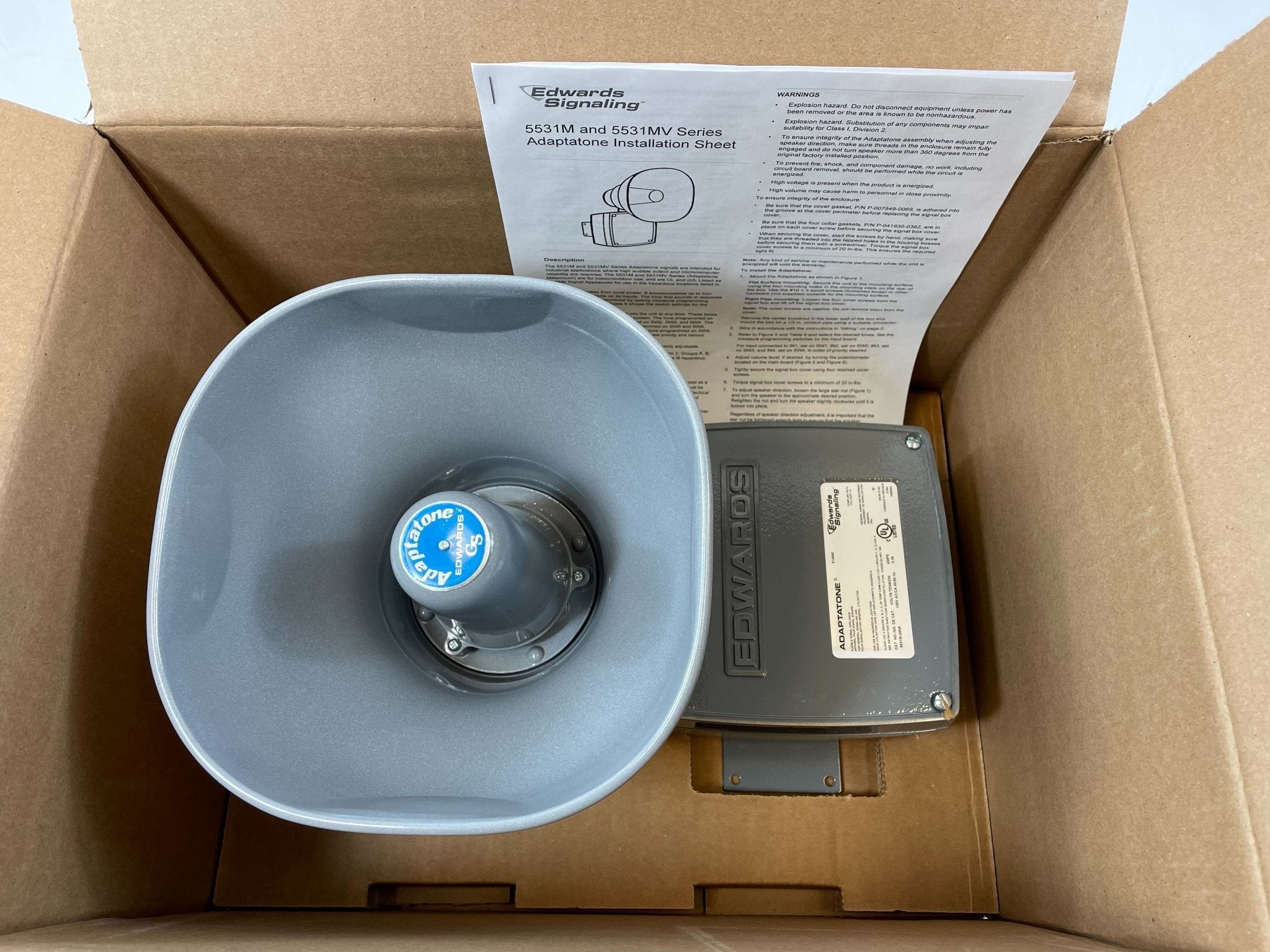 Edwards 5531M-24N5 bell, a metallic industrial alarm bell with mounting bracket, designed for alert systems.