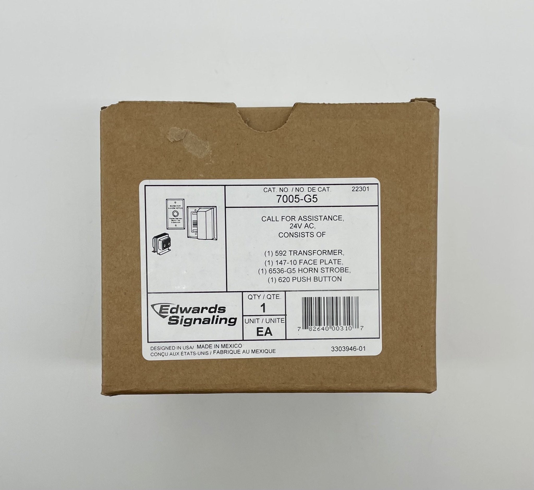 Edwards 7005-G5 fire alarm detector mounted on ceiling, part of Edwards fire alarm system for building safety.