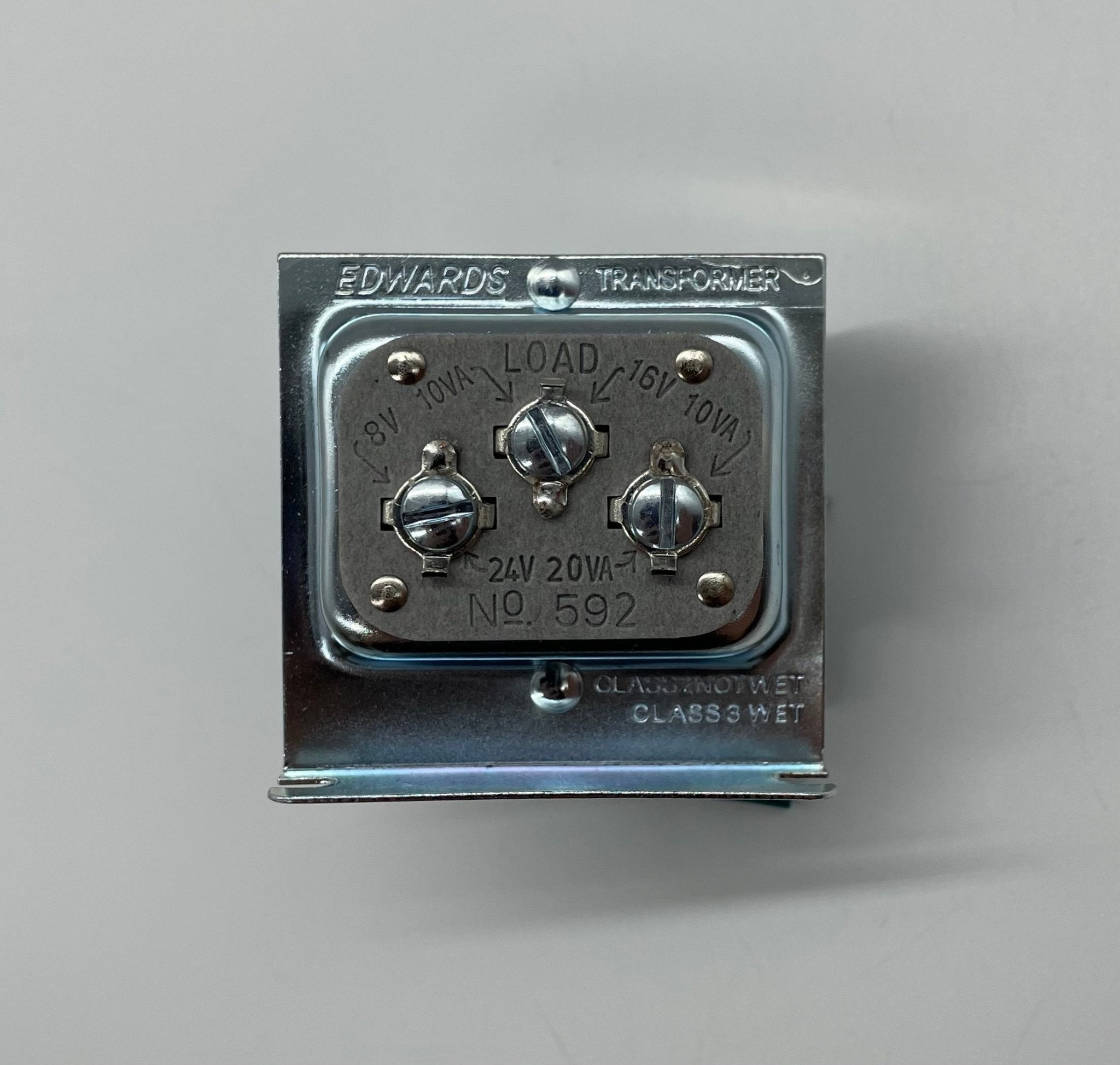 Edwards 7005-G5 fire alarm with smoke detector and control panel, mounted on a wall in a safety system setup.