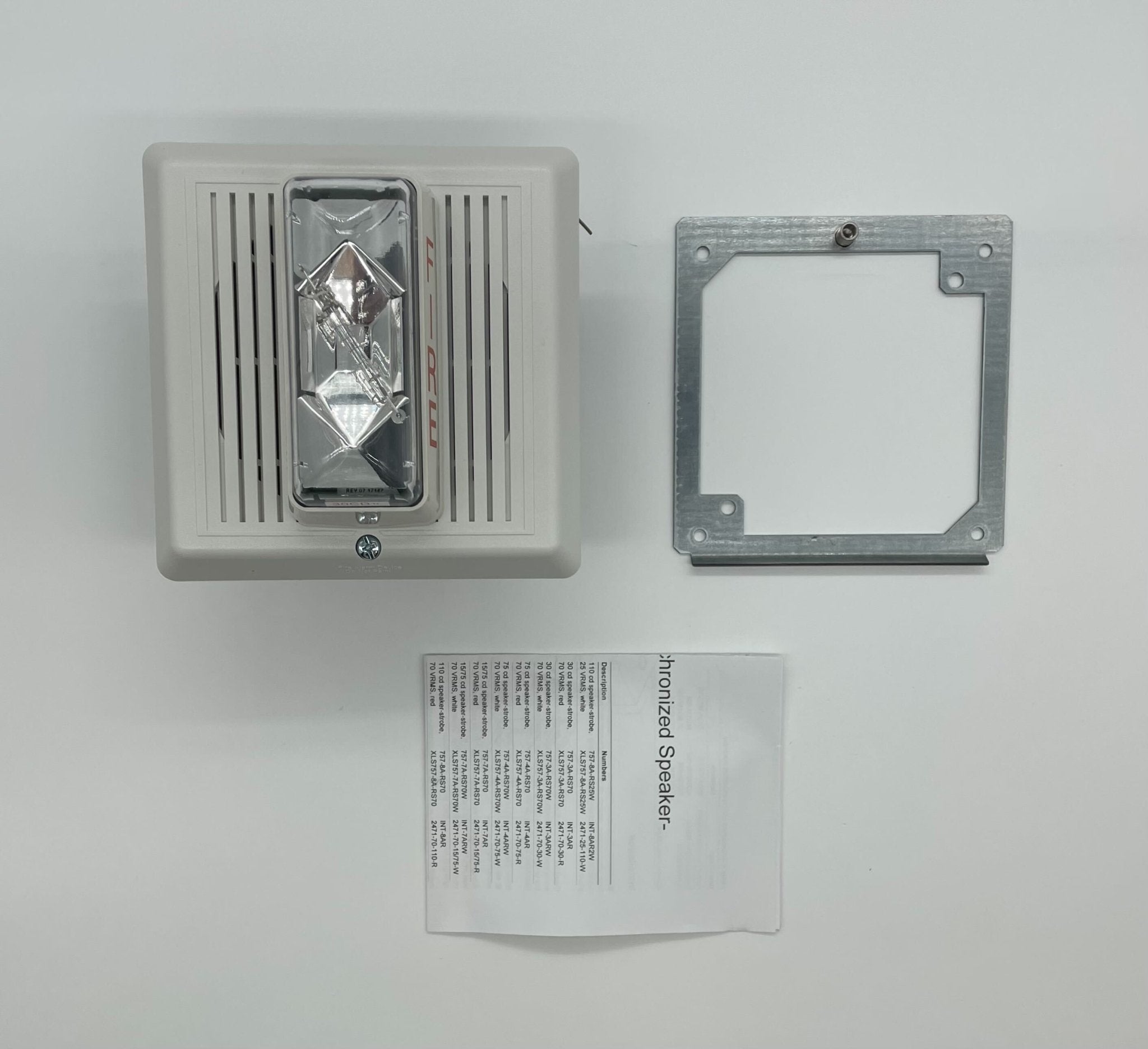 Edwards 757-3A-RS70W speaker strobe light with red lens, mounted on wall for emergency alert signaling.