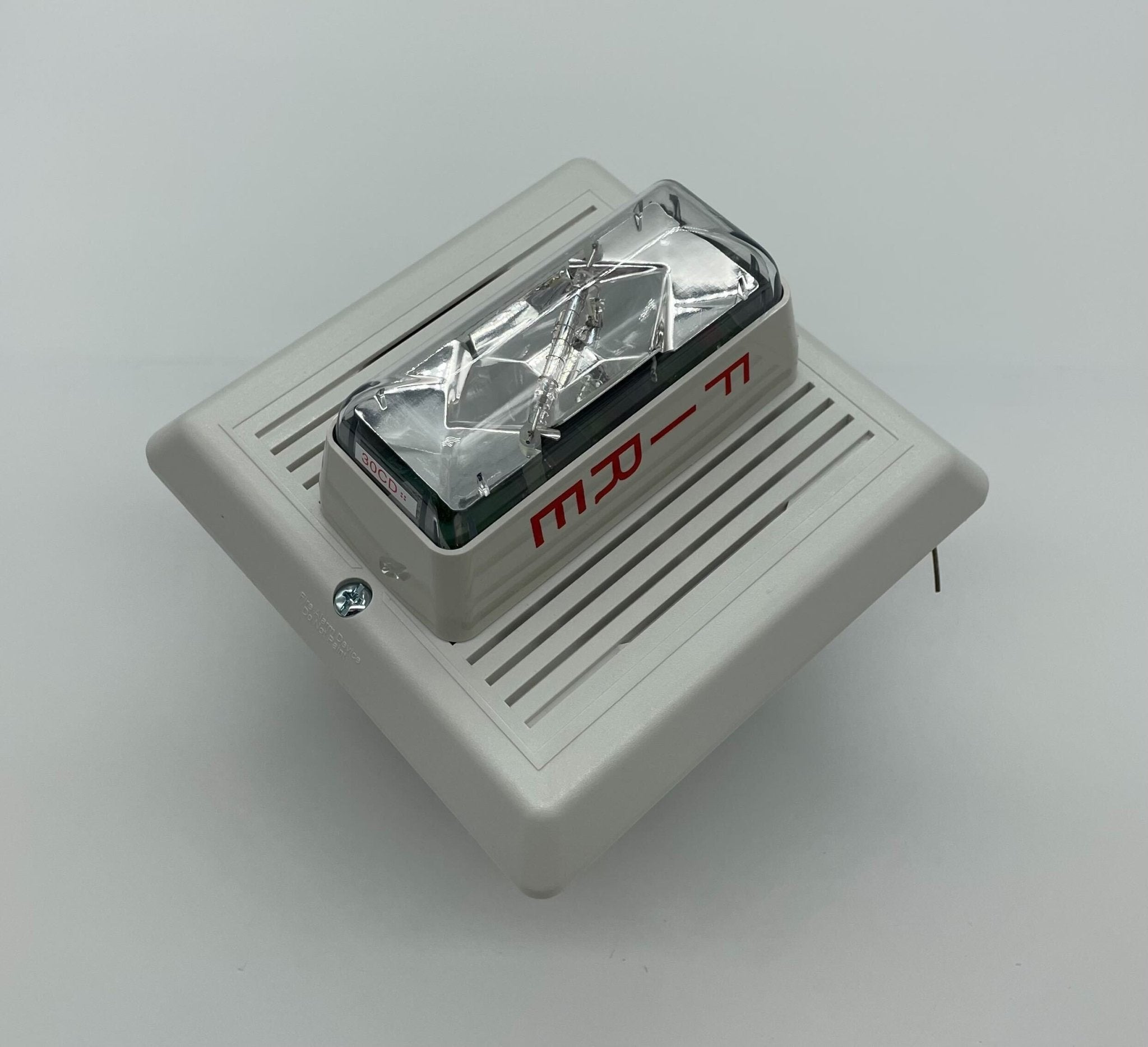 Edwards 757-3A-RS70W speaker strobe with red and white housing, designed for emergency signaling and fire alarm systems.