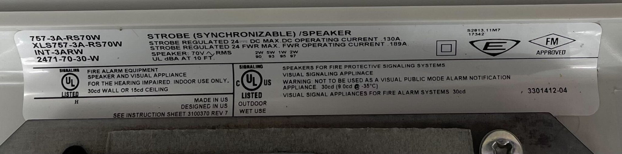 Edwards 757-3A-RS70W speaker strobe with white housing, mounted on wall, for emergency alert signaling.